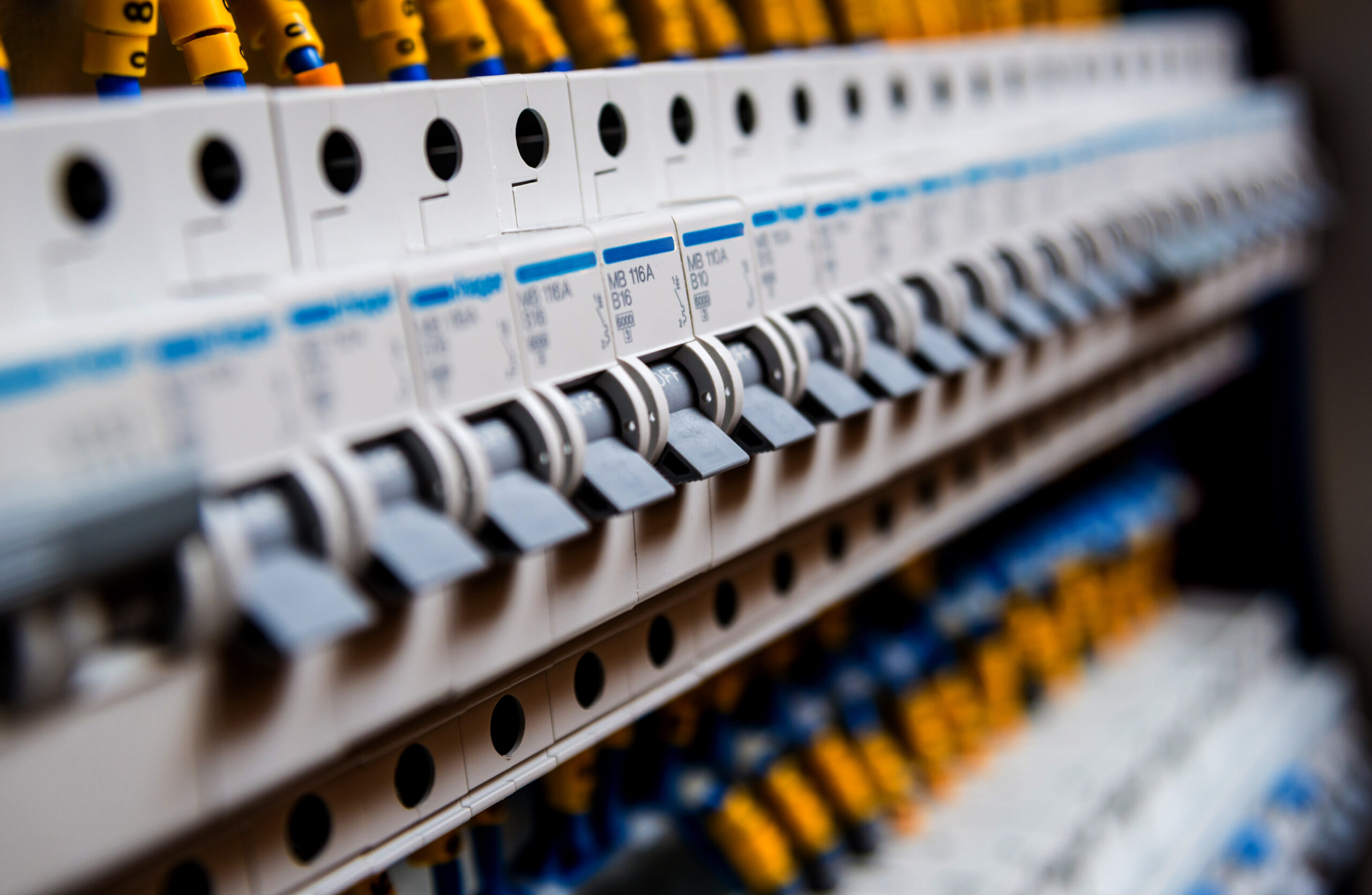 Voltage switchboard with circuit breakers. Electrical background.